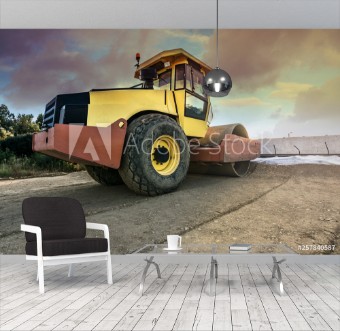 Picture of Steamroller paving a dirt road before paving